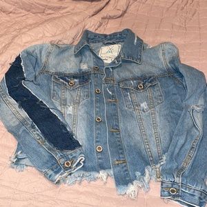 Distressed jean jacket
